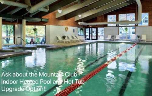 Lincoln House | Mountain Retreat Hot Tub, Arcade & Walk To Loon!