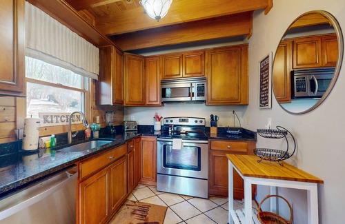 Cherry Log Cabin | Mountain view cabin with game tables, large deck, hot tub, fireplace, & AC