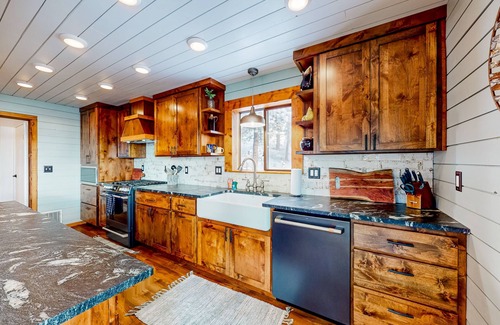 New Meadows Cabin | Mountain-view cabin with private hot tub, furnished deck, 2 kitchens, & 2 W/Ds