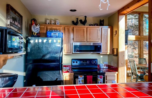 Cullowhee Cabin | Mountain view cabin with expansive deck, balcony, & fireplace - dogs OK