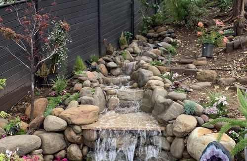 Mira Monte House | Mountaintop Oasis Waterfall House with Hot Tub and Epic Sunset Views!
