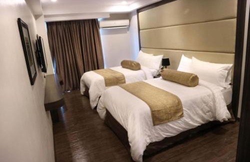 Phil-Am Hotel | My Happy Place West Avenue Suites