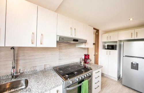 Anahuac Apartment | Nadal 303 · Brand New Park View Designer Apartment