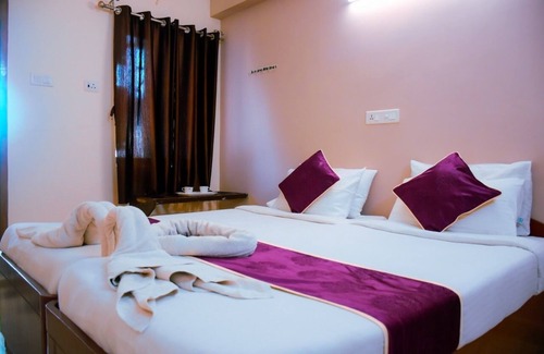 Koyambedu Hotel | Naksha Tree Hotels Kishore Inn - Koyambedu