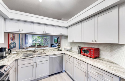 Imperial Golf Estates Condo | NAPLES 2B/2B IMPERIAL CONDO W/STYLE & LAKE VIEWS! POOLS! NEAR EVERYTHING! 102