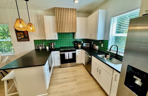 Rockwood House | Nashville made easy. Our 4-bedroom home is 5 min to the airport and 10 min to Broadway, Opry Mills and downtown Sleep well in 1 king, 2 queens and a full bunk bed Garage Game Room with arcade Dog-friendly/Dog park & BBQ grill Fast Wi-Fi