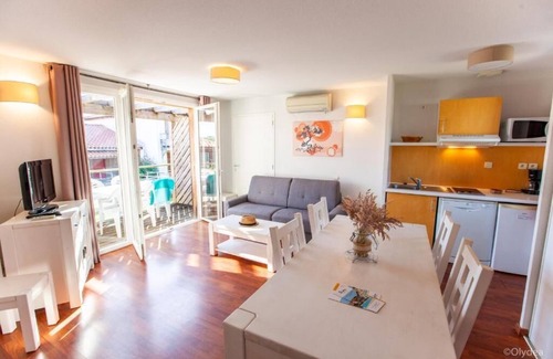 Cassen Apartment | Nature's Retreat: Indoor & Outdoor Pools with Solarium & Playground