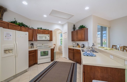 Crescent Lakes House | Near Disney Luxury Lakeside Villa with Spa and Wireless Internet