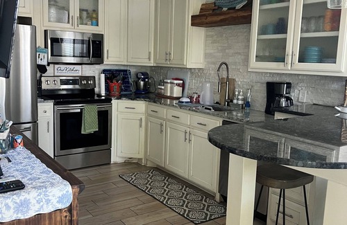 Piney House | Nestled at the bottom of the Ouachita Mountains, lake front living