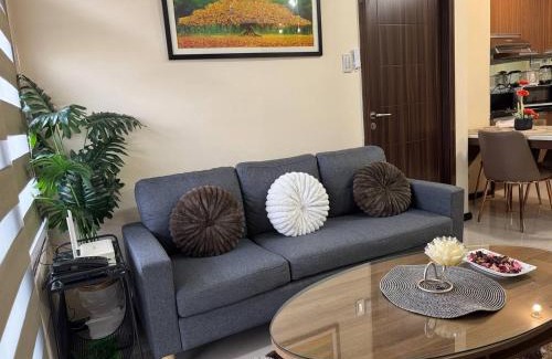 Pasay Apartment | New 1BR Condo in Pasay with Fast WiFi, Netflix, Free Pool and WFH ready Near SM Mall of Asia,NAIA and OKADA