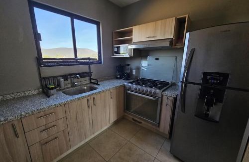 Jimenez Apartment | New Bamboo Los Pirineos business and leisure