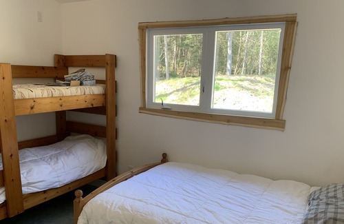 Cayamant Cottage | New build Lakefront cottage with 117 Acres