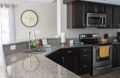 Lake of the Ozarks House | NEW! Charming 4-bedroom family-friendly lakefront house in Sunrise Beach!