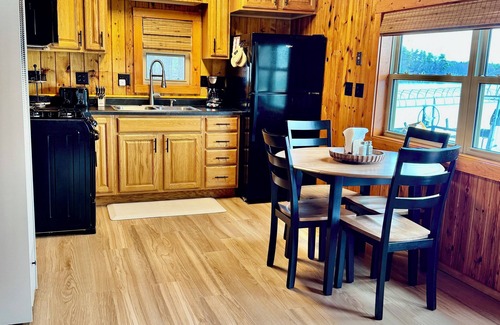 Spooner Cottage | NEW Cottages on the Lake Near Spooner WI. Steps from sand shore of McKenzie Lake