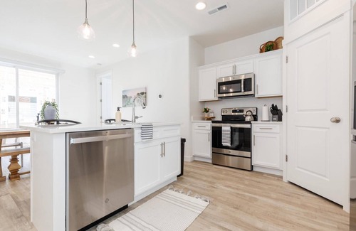 Garden City Villa | New Designer Townhome w Trailer Parking Games
