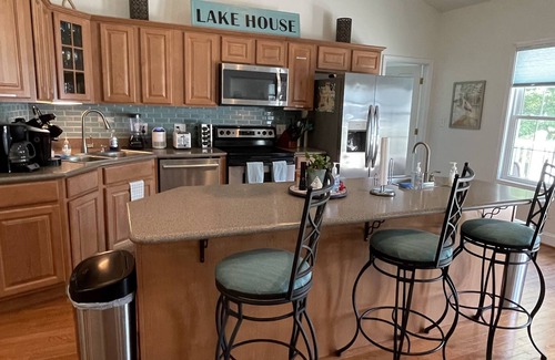 Littleton House | NEW DISCOUNTS 2025 listed-Lakefront home with pool, jacuzzi, and gorgeous views!