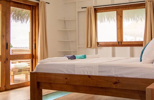 Isla Solarte Bed & Breakfast | (NEW!) Entire Exclusive Overwater Bungalow B&B - Glass Floors, Free Breakfast