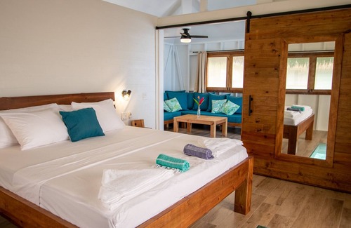 Isla Solarte Bed & Breakfast | (NEW!) Entire Exclusive Overwater Bungalow B&B - Glass Floors, Free Breakfast