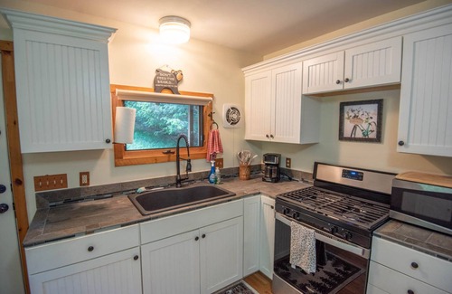 Warrensville Cabin | NEW! Getaway in Warrensville w/ Creek & Fire Pit