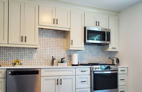 Asbury Park House | NEW IN ASBURY - Sunny home with deck, patio, and gorgeous backyard!