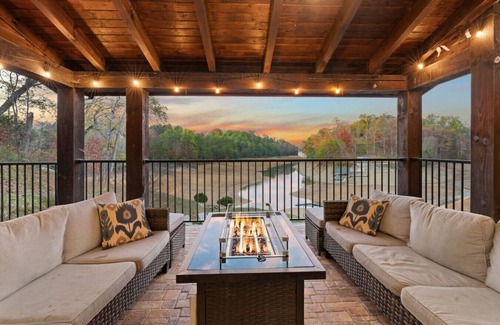 Sevierville Cabin | New! Lakefront Luxury! Fireplaces*Hot Tub*Privacy