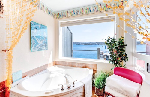 Historic Bayfront Apartment | New listing! Deluxe bayfront studio w/jetted tub & fireplace - near the beach!