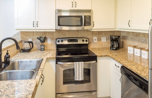 Leeward Settlement Condo | NEW! Luxury 1-Bed Condo in Upscale Gated Community !