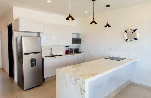 Telchac Puerto Condo | New Modern 3BR Beachfront Condo in San Benito