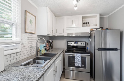 East Pensacola Heights House | NEW POOL NOW AVAILABLE FOR USE! Unit was meticulously furnished to give a coastal/farm house vibe