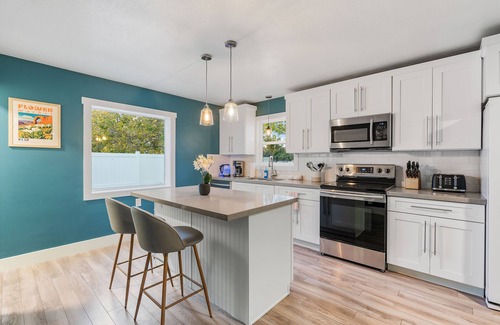 South Salt Lake House | NEW & Remodeled! King Beds, Hot Tub, Firepit, GameRoom, Huge Backyard, Mtn Views