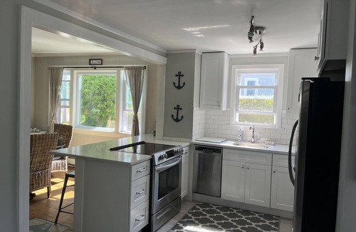 Silver Beach Cottage | New Silver Beach Cottage just a short walk to association beach and harbor!