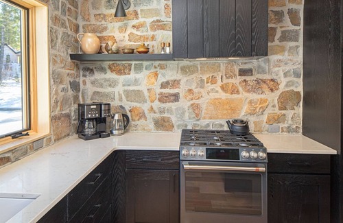 Whitefish House | New! Ski-In/Ski-Out townhome with hot tub and fireplaces
