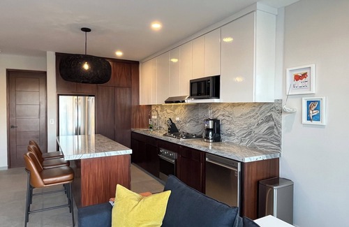 Libertad Condo | New! Slick designer apARTtment with bay views.
