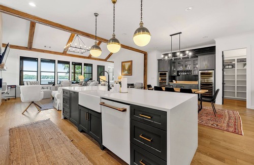 Buckhead House | NEW Stunning Lakefront Heated Pool Spa Game Room Putting Green Dock