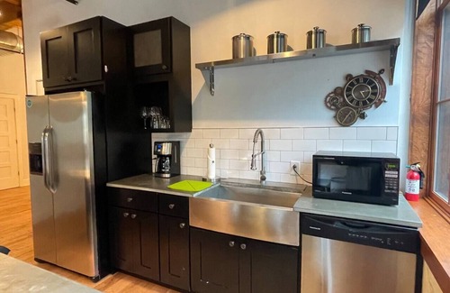 Rochester Apartment | NEW TO VRBO: Industrial History with a Modern Day Design Loft Apartment