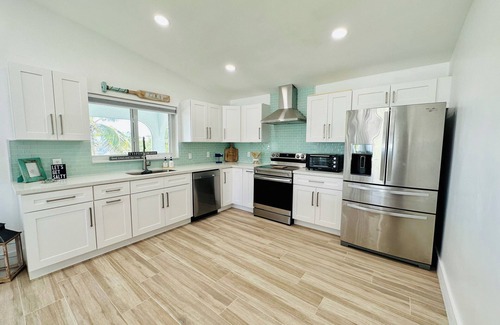 Twin Lakes House | New to VRBO! Relax & Recharge at Key Largo’s Premier Waterfront Property!
