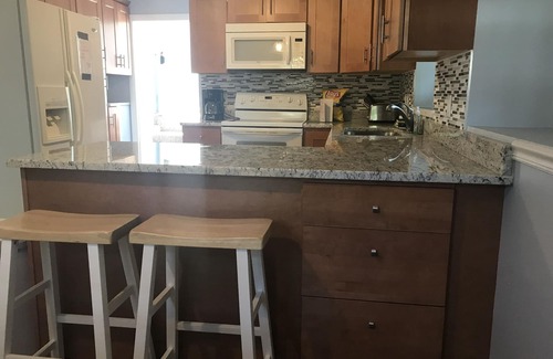 Narragansett House | Newly remodeled home steps from Narrow River