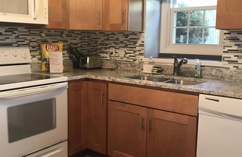 Narragansett House | Newly remodeled home steps from Narrow River