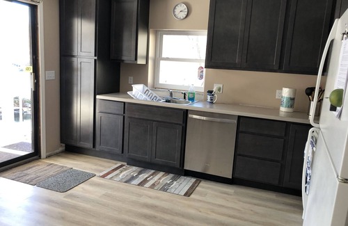 Sunrise Beach House | Newly renovated 1st flr kitchen, dining-living area, 2nd flr bedrooms, and bath.