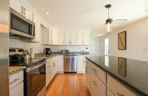 Harrison House | * NEWLY RENOVATED * 4-bedroom home on Long Lake with sunset views!