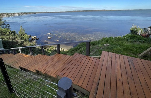 Toukley House | Newly renovated 4-bedroom lakefront home is perfect for your next family getaway