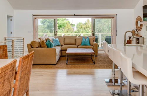 Clearwater Beach House | Newly renovated contemporary with glimpse of Gardiners Bay, custom details.