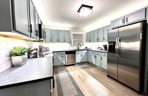 Green Meadow House | Newly renovated home with private heated saltwater pool, close to beach and UNCW