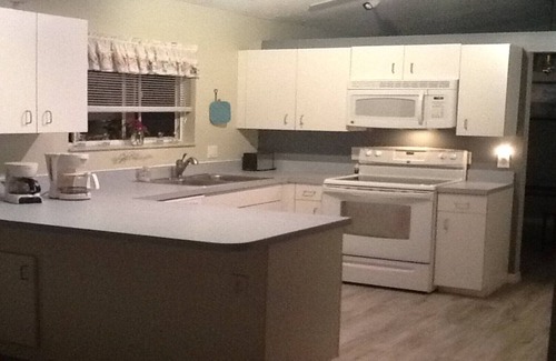 Gardens of Gulf Cove House | Newly renovated lake-view home in quiet neighborhood near the beach