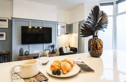 Newport Apartment | Newport's heart: Steps from shops & local charm!