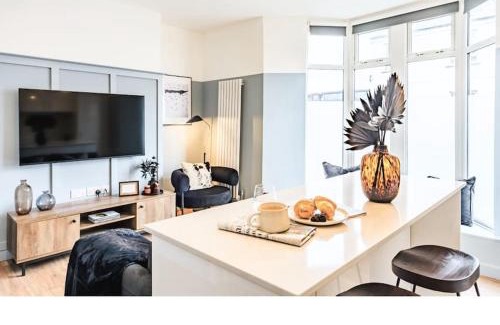 Newport Apartment | Newport's heart: Steps from shops & local charm!