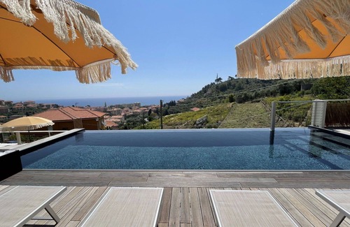 San Lorenzo al Mare Apartment | Nice apartment for 4 guests with pool, WIFI, A/C, TV, patio and parking