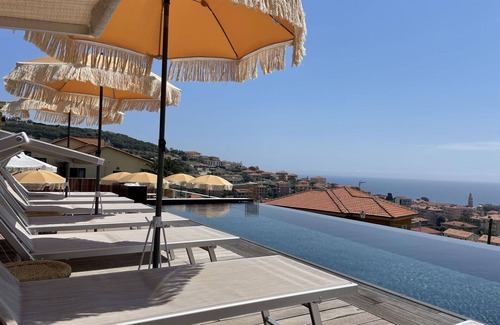 San Lorenzo al Mare Apartment | Nice apartment for 4 guests with pool, WIFI, A/C, TV, patio and parking