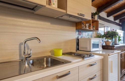 Vito d'Asio Apartment | Nice apartment for 2 guests with A/C, pool, WIFI, TV, patio and pets allowed