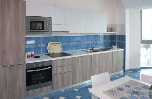 Latina Lido Apartment | Nice apartment for 5 guests with A/C, pool, WIFI, TV, balcony, pets allowed and parking